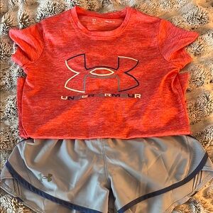 Under Armour Kids coral t-Shirt and light purple Shorts Set.